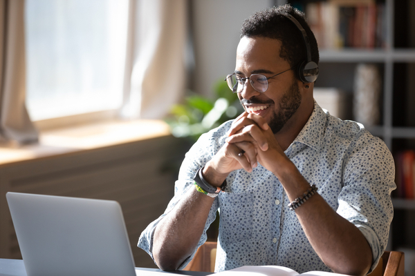 An Adult Enjoying His Online Class